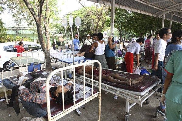 In this image provided by The Myanmar Military True News Information Team, victims caused by an earthquake is seen compound of government hospital Friday, March 28, 2025, in Naypyitaw, Myanmar. (The Myanmar Military True News Information Team via AP)