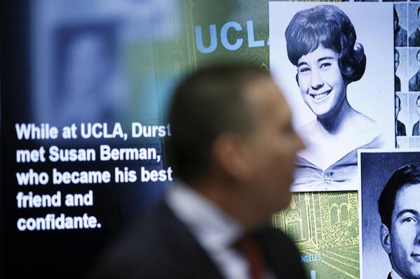 FILE - In this March 4, 2020, file pool photo Deputy District Attorney John Lewin presents opening arguments with a photo displayed of Susan Berman during Robert Durst's murder trial at the Airport Branch Courthouse in Los Angeles. A Los Angeles jury convicted Robert Durst Friday, Sept. 17, 2021 of murdering his best friend 20 years ago in a case that took on new life after the New York real estate heir participated in a documentary that connected him to the slaying linked to his wife’s 1982 disappearance.  (Etienne Laurent/EPA via AP, Pool, File)