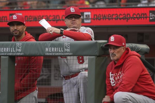 FILE - St. Louis Cardinals manager Mike Shildt, middle, is shownduring a baseball game against the San Francisco Giants in San Francisco, in this Tuesday, July 6, 2021, file photo. The Cardinals fired former National League manager of the year Mike Shildt over organizational differences Thursday, Oct. 14, 2021, just one week after St. Louis lost to the Los Angeles Dodgers on a walk-off homer in the wild-card game.  (AP Photo/Jeff Chiu, File)