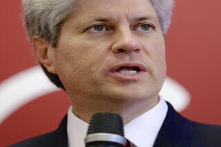 FILE - In this May 14, 2014, file photo, U.S. Rep. Jeff Fortenberry, R-Neb., speaks in Lincoln, Neb.  Fortenberry expects to be charged with lying to the FBI while federal agents were investigating campaign contributions funneled to him from a Nigerian billionaire, the nine-term Republican said as he proclaimed his innocence and promised to fight the charges. In a YouTube video posted Monday night, Oct. 18, 2021, he said he was “shocked” and “stunned” by the allegations and asked his supporters to rally behind him. (AP Photo/Nati Harnik, File)