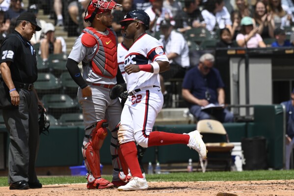 DeJong, Contreras lead Cards past White Sox 4-3 in 10 innings