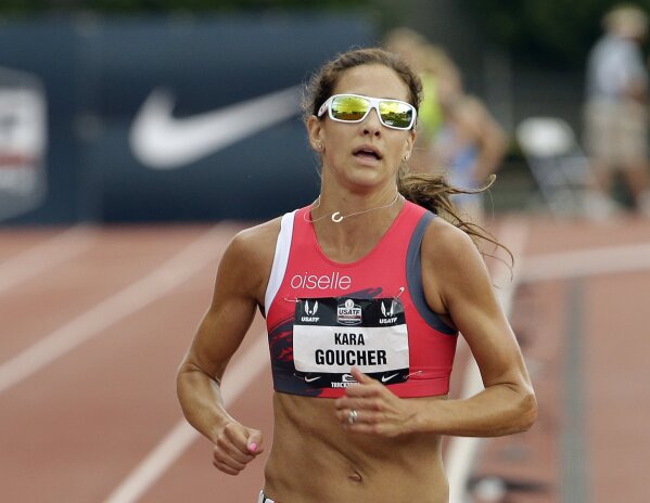 FILE - In this June 28, 2015, file photo, Kara Goucher runs in the 5,000-meter event at the U.S. Track and Field Championships in Eugene, Ore. A rebellion led by some of track and field's top athletes, like Goucher, had led to changes in sponsorship contracts that are altering what could best be described as the sport's 'pregnancy penalty.' For decades, the message to women in track and field was crystal clear: get pregnant, lose sponsorship money. (AP Photo/Don Ryan, File)