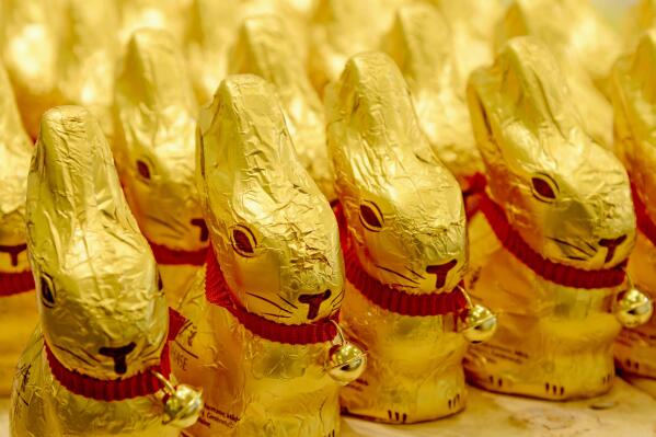 FILE - In this March 14, 20215 file photo chocolade easter bunnies of Lindt stand in a supermarket in Freiburg, Germany.  A German federal court ruled Thursday that the golden shade of the foil wrap on Lindt & Spruengli's Gold Bunny, a popular chocolate Easter bunny, enjoys protected status. (Winfried Rothermel/dpa via AP, file)