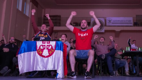 People react watch a live broadcasting of Game 5 of basketball's NBA Finals between Denver Nuggets and Miami Heat in a sports hall in the northern Serbian town of Sombor, Tuesday, June 13, 2023. It was barely dawn when Nikola Jokic’s hardcore fans in his Serbian hometown of Sombor chanted MVP, MVP and celebrated the Denver Nuggets’ first NBA title. Denver trailed Miami Heat halftime of Game 5 but rallied to win 94-89. Two-time league MVP Jokic posted 28 points and 16 rebounds and was voted Most Valuable Player of the NBA finals. (AP Photo/Darko Vojinovic)