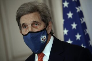 U.S. special envoy for climate John Kerry attends a press conference with French Environment Minister Barbara Pompili Thursday, March 11, 2021 in Paris. John Kerry on Wednesday called on the world's biggest polluters to make "key decisions" in the coming months that would rein in climate change. Kerry discussed preparations for a U.S.-hosted climate summit Apr. 22-23 that will virtually gather the leader of twenty countries that pump out 81% of the world's greenhouse gas emissions. (AP Photo/Christophe Ena)