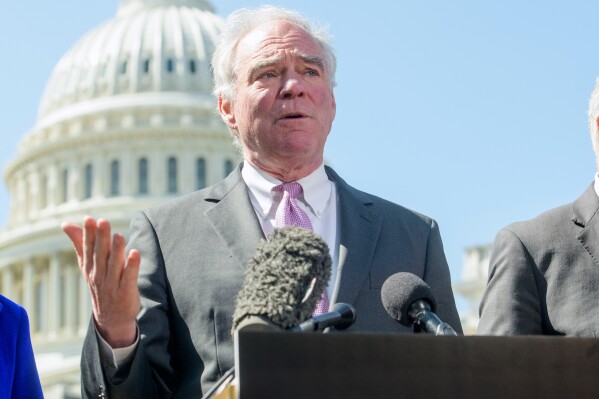 Sen. Tim Kaine, D-Va., speaks at a news conference regarding President Donald Trump's pending tariffs on Canada, at the Capitol, Tuesday, April 1, 2025, in Washington. (AP Photo/Rod Lamkey, Jr.)