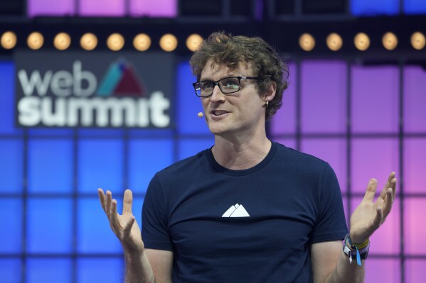 File - Paddy Cosgrave, CEO and founder of Web Summit, speaks at the Web Summit technology conference in Lisbon on Nov. 1, 2021. The fallout from the Israel-Hamas war has spilled into workplaces everywhere, as top leaders of prominent companies weigh in with their views and workers complain of their own voices not being heard. Backlash has been swift, including to a tweet from Cosgrave suggesting that Israel was committing war crimes. (AP Photo/Armando Franca, File)