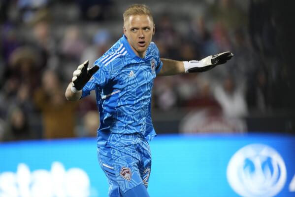 Colorado Rapids goalkeeper William Yarbrough reacts after stopping a Charlotte FC shot during the first half of an MLS soccer match Saturday, April 23, 2022, in Commerce City, Colo. (AP Photo/David Zalubowski)