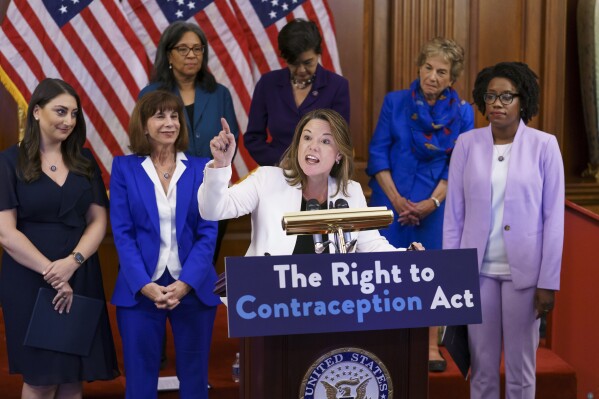 FILE - Rep. Angie Craig, D-Minn., center, speaks during an event with Democratic women House members and advocates for reproductive freedom ahead of the vote on the Right to Contraception Act, at the Capitol in Washington, July 20, 2022. She is joined from left by Rep. Sara Jacobs, D-Calif., Rep. Kathy Manning, D-N.C., and Rep. Lauren Underwood, D-Ill. Republican lawmakers in states across the U.S. have been rejecting Democrats' efforts to protect or expand access to birth control, an issue Democrats are promoting as a major issue in this year's elections along with abortion and other reproductive rights concerns. (AP Photo/J. Scott Applewhite, File)