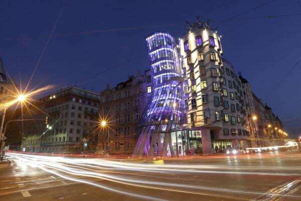 FILE - A view of the Dancing House in Prague, Czech Republic, Tuesday, Sept. 20, 2016. Vlado Milunic, a Czech architect of Croatian origin, who co-designed Prague’s iconic Dancing House together with his famed colleague Frank Gehry, has died on Saturday, Sept. 17, 2022. He was 81. (AP Photo/Petr David Josek, File)