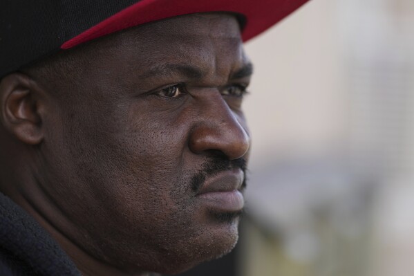 Haitian immigrant Idaneau Mintor, a meat plant worker, reflects on his status in the United States, Tuesday, April 15, 2025, in Dumas, Texas. (AP Photo/Eric Gay)