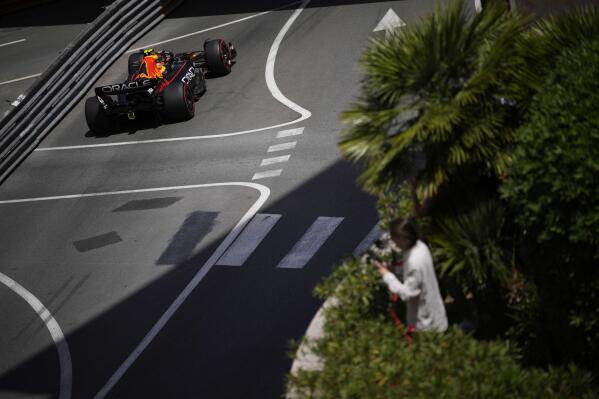 Red Bull driver Sergio Perez of Mexico steers his car during the third free practice at the Monaco racetrack, in Monaco, Saturday, May 28, 2022. The Formula one race will be held on Sunday. (AP Photo/Daniel Cole)