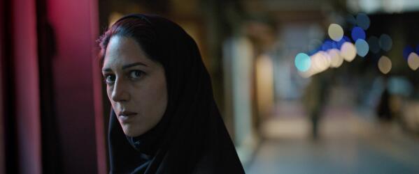 This image released by Utopia shows Zar Amir Ebrahimi in a scene from "Holy Spider." Ebrahimi stars as a journalist investigating a serial killer in the eastern Iranian city of Mashhad who is murdering women and sex workers. (Utopia via AP)
