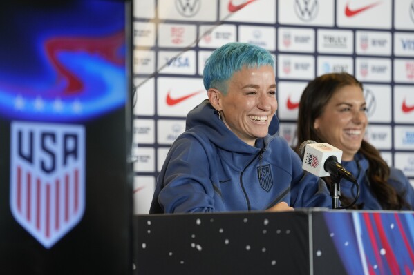 Megan Rapinoe, left, and Alex Morgan speak to reporters during the 2023 Women's World Cup media day for the United States Women's National Team in Carson, Tuesday, June 27, 2023. (AP Photo/Ashley Landis)