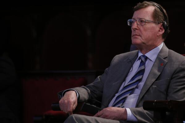 FILE - Northern Irish Nobel Peace Prize laureate David Trimble attends during the opening ceremony of the 15th World Summit of Nobel Peace Laureates at the University in Barcelona, Spain, Nov. 13, 2015. David Trimble helped end decades of violence in Northern Ireland by shunning his hardline unionist past and negotiating with a former foe in pursuit of a goal they both shared: Peace. That willingness to compromise was remembered Tuesday on both sides of the Atlantic as world leaders honored Trimble, who died Monday, July 25, 2022 at the age of 77.   (AP Photo/Manu Fernandez, file)