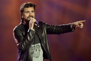 
              FILE - In this Dec. 11, 2015 file photo, Colombian singer Juanes performs during the 40 Principales Awards in Madrid, Spain. Juanes has written, “Goodbye For Now,” his first English song for his upcoming visual album. (AP Photo/Abraham Caro Marin, File)
            