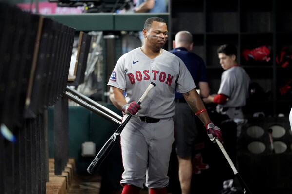 Rafael Devers fans twice more to give him an MLB-record 12 in Red Sox's  first 4 games | AP News