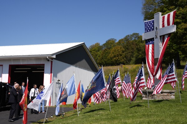 President Joe Biden and Democratic presidential nominee Vice President Kamala Harris attend a ceremony marking the anniversary of the Sept. 11 terror attacks at the Flight 93 National Memorial, Wednesday, Sept. 11, 2024, in Shanksville, Pa. (AP Photo/Evan Vucci)