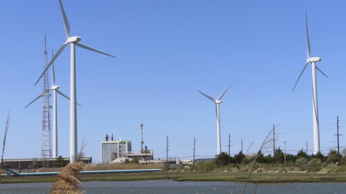 Land-based windmills turn in the wind in Atlantic City, N.J., on April 28, 2022. On July 3, 2023, Atlantic Shores, the approved developer of New Jersey's third offshore wind farm, said it, too, wants a tax break or other financial assistance, hinting that its project might not be able to be done without the kind of assistance New Jersey lawmakers granted the week before to a competitor, Orsted, which has approval to build two of the state's three approved offshore wind farms. (AP Photo/Wayne Parry)