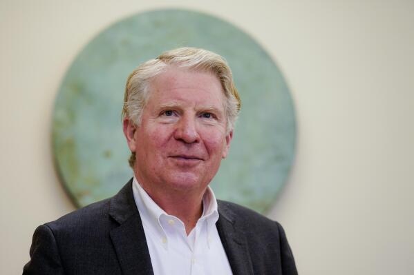 Cyrus Vance Jr., Manhattan District Attorney, is interviewed in his office, Tuesday, Nov. 30, 2021, in New York. After a dozen years in office, one piece of unfinished business remains for Vance before he retires at the end of the month. Will the prosecutor known for his caution bring criminal charges against Donald Trump? Fellow Democrat Alvin Bragg takes over the office Jan. 1. (AP Photo/John Minchillo)