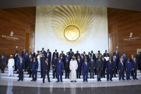 FILE - Leaders gather for a group photo at the African Union Summit in Addis Ababa, Ethiopia, on Feb. 18, 2023. Calls for unity dominated the 60th anniversary celebrations on Thursday, May 25, 2023 for the continent-wide organization preceding the African Union (AU) but critics say the AU has become a paper tiger where there's plenty of talk, but not much much real clout to enforce its mandate. (AP Photo, File)