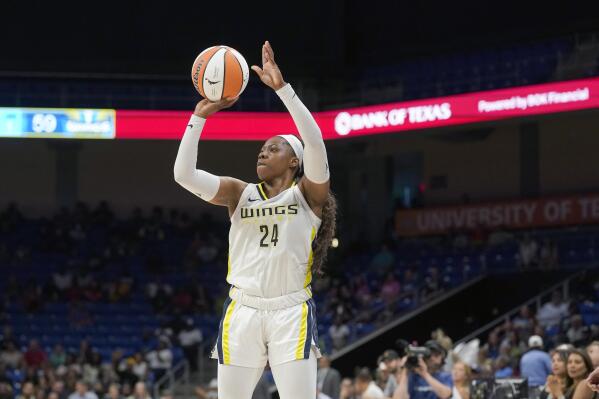 Dallas Wings guard Arike Ogunbowale (24) shoots during the second half of a WNBA basketball game against the Connecticut Sun in Arlington, Texas, Tuesday, July 5, 2022. The Wings won 82-71. (AP Photo/LM Otero)