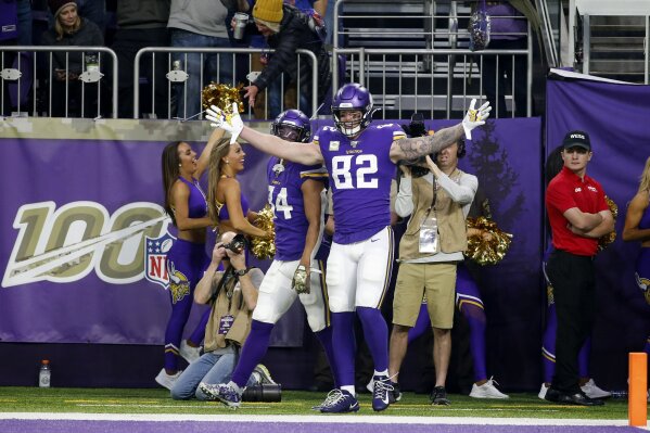 Minnesota Vikings tight end Kyle Rudolph celebrates after catching a 32-yard touchdown pass during the second half of an NFL football game against the Denver Broncos, Sunday, Nov. 17, 2019, in Minneapolis. (AP Photo/Bruce Kluckhohn)