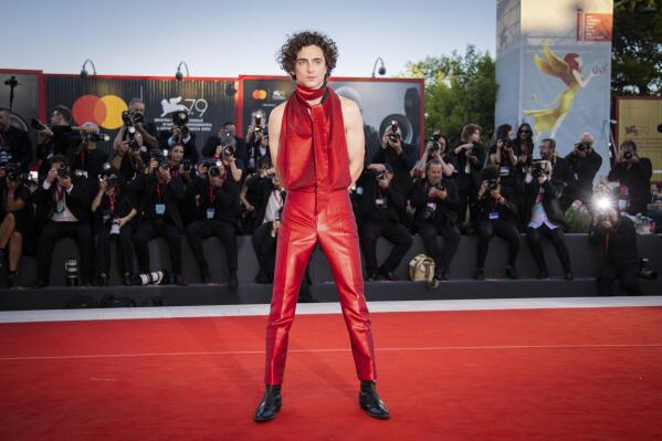 Timothee Chalamet poses for photographers upon arrival at the premiere of the film 'Bones and All' during the 79th edition of the Venice Film Festival in Venice, Italy, Friday, Sept. 2, 2022. (Photo by Vianney Le Caer/Invision/AP)
