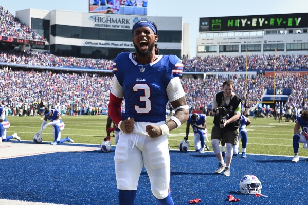 Buffalo Bills safety Damar Hamlin (3) shouts while warming up prior to an NFL football game against the Miami Dolphins, Sunday, Oct. 1, 2023, in Orchard Park, N.Y. (AP Photo/Adrian Kraus)