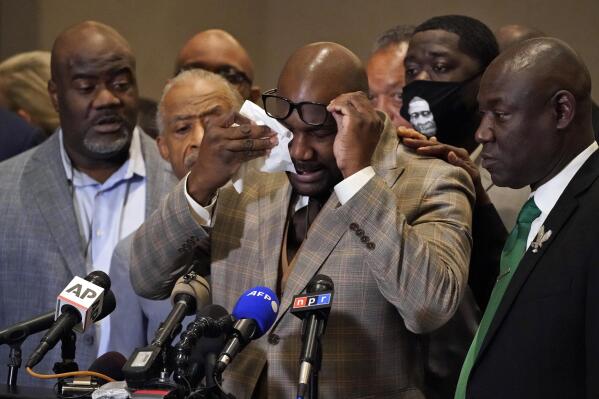 George Floyd's brother Philonise Floyd wipes his eyes during a news conference, Tuesday, April 20, 2021, in Minneapolis, after the verdict was read in the trial of former Minneapolis Police officer Derek Chauvin for the murder of George Floyd. (AP Photo/Julio Cortez)