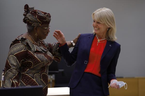 World Trade Organization Director-General Ngozi Okonjo-Iweala, left, talks to Sweden's Foreign Trade Minister Anna Hallberg during a European Foreign Trade ministers meeting at the European Council headquarters in Brussels, Thursday, May 20, 2021. (AP Photo/Francisco Seco, Pool)