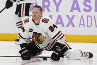 Chicago Blackhawks right wing Corey Perry (94) warms up before an NHL hockey game against the Nashville Predators, Saturday, Nov. 18, 2023, in Nashville, Tenn. (AP Photo/George Walker IV)