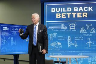President Joe Biden answers a question from a reporter following a virtual meeting from the South Court Auditorium at the White House complex in Washington, Wednesday, Aug. 11, 2021, to discuss the importance of the bipartisan Infrastructure Investment and Jobs Act. (AP Photo/Susan Walsh)