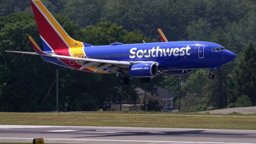 FILE - Southwest Airlines Boeing 737 lands at Manchester Boston Regional Airport, June 2, 2023, in Manchester, N.H. Personal information for more than 8,000 applicants to become pilots at American Airlines and Southwest Airlines was stolen when hackers broke into a data base maintained by a recruiting company. The breach at Austin, Texas-based Pilot Credentials occurred on April 30, and the airlines learned about it on May 3. (AP Photo/Charles Krupa, File)