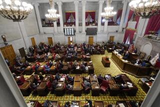 FILE - The Tennessee House of Representatives meets Oct. 27, 2021, in Nashville, Tenn. Tennessee lawmakers have confirmed the governor's appointment of a businessman to the State Board of Education despite lawsuits over his company's sale of ammunition online, including the bullets used in a mass shooting at a Texas high school. The Republican-supermajority General Assembly gave its final approval to Jordan Mollenhour in a 71-14 House vote Thursday, March 17, 2022. The Senate approved the pick last week. (AP Photo/Mark Humphrey, File)