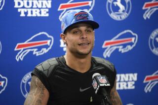 Poyer chooses friends, familiarity in re-signing with Bills | AP News