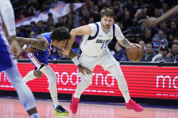 Irving, Doncic power Mavericks past 76ers without injured Embiid, 118-102