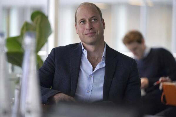 FILE - Britain's Prince William smiles during a visit to Microsoft HQ to learn how new AI scanning technology can increase detection of illegal wildlife products being trafficked through international airports, in Reading, England, Nov. 18, 2021. Prince William says he will support and respect whatever decision the people make as Caribbean nations debate their relationship with the British crown. William made the comments after an eight-day tour of Belize, Jamaica and the Bahamas that ended March 26, 2022. (Steve Parsons/Pool Photo via AP, File)