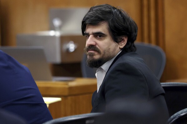 FILE - Arizona graduate student Murad Dervish sits in Pima County Superior Court, May 8, 2024, in Tuscon, Ariz. Closing arguments are scheduled for Monday, May 20, in the trial of Dervish, who is accused of killing a professor on campus two years ago. (Mamta Popat/Arizona Daily Star via AP, File)