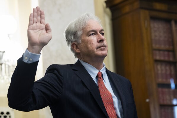 William Burns is sworn in before a Senate Intelligence Committee hearing on his nomination to be director of the Central Intelligence Agency, Wednesday, Feb. 24, 2021 on Capitol Hill in Washington.  (Tom Williams/Pool via AP)