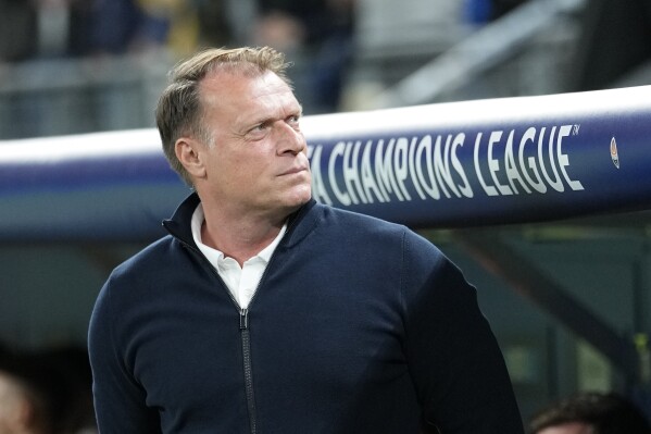 Shakhtar's head coach Patrick van Leeuwen watches prior the UEFA Champions League Group H soccer match between Shakhtar Donetsk and FC Porto in Hamburg, Germany, Tuesday, Sept. 19, 2023. (AP Photo/Martin Meissner)