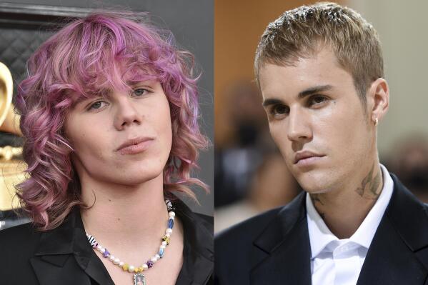 The Kid Laroi appears at the 64th Annual Grammy Awards in Las Vegas on April 3, 2022, left, and Justin Bieber appears at The Metropolitan Museum of Art's Costume Institute benefit gala in New York on Sept. 13, 2021. “Stay,” the smash hit by The Kid Laroi and Justin Bieber topped Apple Music’s global song chart in 2022.  (AP Photo)
