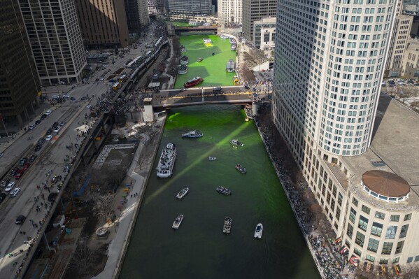 The Chicago River is dyed green ahead of St. Patrick's Day celebrations, Saturday, March 16, 2024, in Chicago. (AP Photo/Erin Hooley)