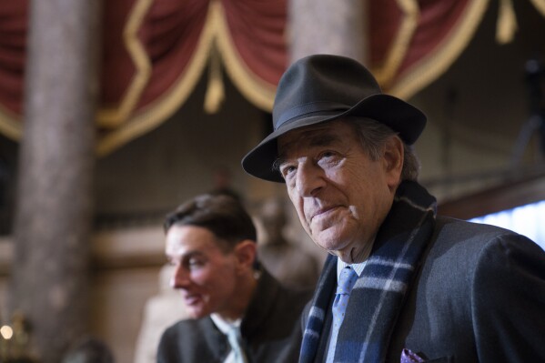 FILE - Paul Pelosi attends a portrait unveiling ceremony for his wife, Speaker of the House Nancy Pelosi, D-Calif., in Statuary Hall at the Capitol in Washington, Dec. 14, 2022. (AP Photo/J. Scott Applewhite, File)
