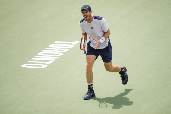 Britain's Andy Murray celebrates against Italy's Lorenzo Sonego at the National Bank Open men's tennis tournament in Toronto, Tuesday, Aug. 8, 2023. (Mark Blinch/The Canadian Press via AP)