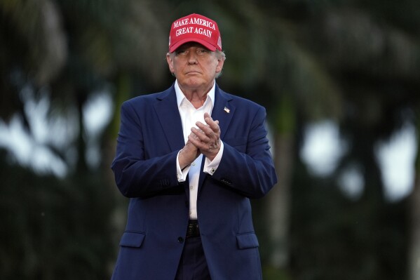 Republican presidential candidate former President Donald Trump arrives for a campaign rally at Trump National Doral Miami, Tuesday, July 9, 2024, in Doral, Fla. (AP Photo/Rebecca Blackwell)