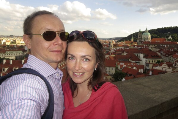 Pavel Butorin, director of the current time, TV and digital platform of Radio Free Europe/Radio Liberty, and his wife Russian-American journalist Alsu Kurmacheva pose for a photo in Prague, Czech Republic on Wednesday Aug. 14, 2013. Kurmacheva, the editor with Radio Free Europe/Radio Liberty's Tatar-Bashkir service was detained on Oct 18, 2023 in Russia and is being held in a detention center, awaiting a trial that could sentence her to up to five years in prison. (Pavel Butorin via AP)
