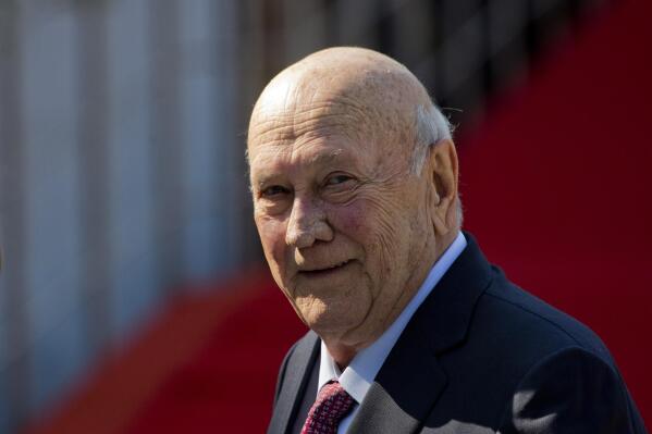 FILE - Former South African President F.W. de Klerk arrives for the swearing-in ceremony of newly-elected President Cyril Ramaphosa in Pretoria, South Africa, May 25, 2019. South Africa is engrossed in debate over the legacy of apartheid's last president, de Klerk, who died at 85 and is to be buried Sunday, Nov 21, 2021. Some people want to remember de Klerk as the liberator of Nelson Mandela, but others say he was responsible for racist murders. (AP Photo/Jerome Delay, File)