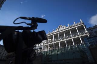 A camera directed on Palais Coburg, where closed-door nuclear talks take place in Vienna, Austria, Friday, Dec. 17, 2021. (AP Photo/Michael Gruber)