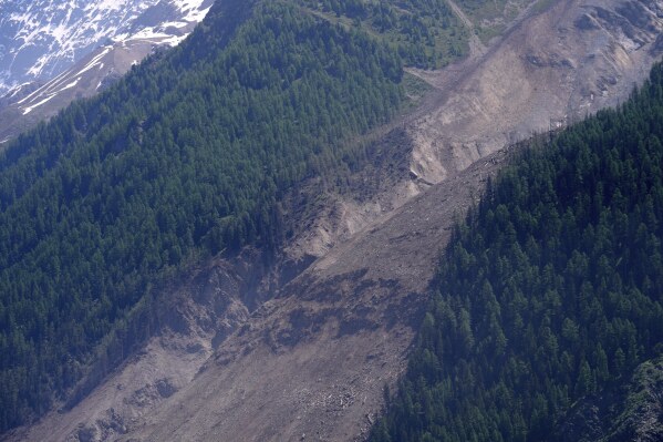 The aftermath of the Birch Glacier collapse is visible in Blatten, Switzerland, June 11, 2025. (AP Photo/Matthias Schrader)